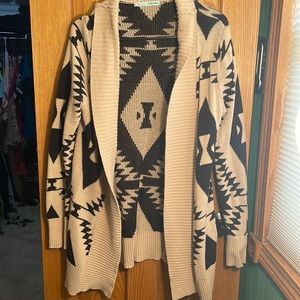 Maurice’s size medium cardigan. Like new